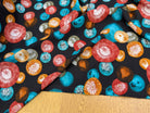TISSU 100% VISCOSE IMPRIMÉ FOND NOIR MOTIFS CIRCULAIRES - My Little Coupon