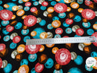 TISSU 100% VISCOSE IMPRIMÉ FOND NOIR MOTIFS CIRCULAIRES - My Little Coupon