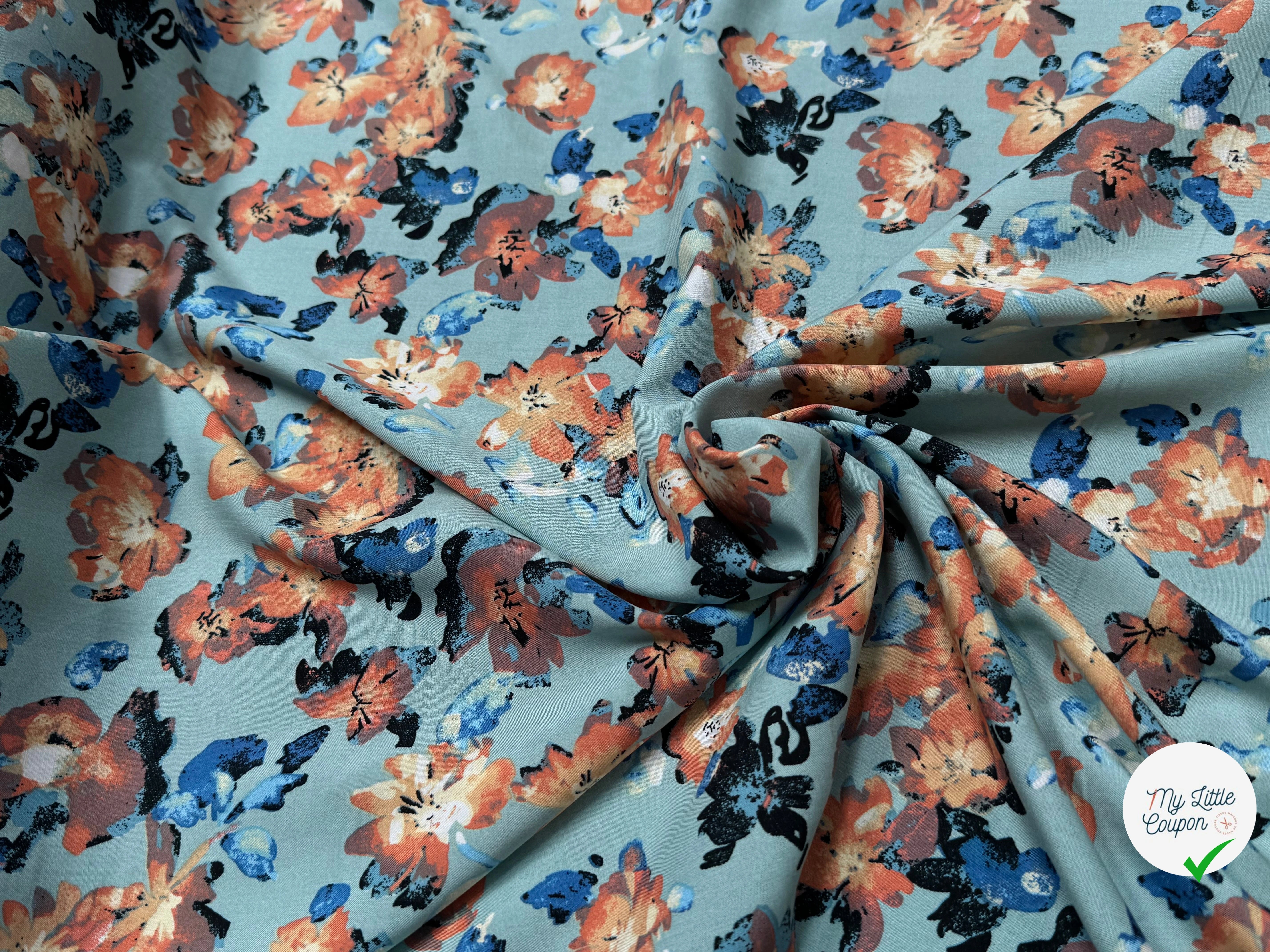 TISSU 100% VISCOSE IMPRIMÉ GROSSES BASES DE FLEURS FOND VERT D'EAU - My Little Coupon