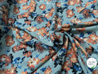 TISSU 100% VISCOSE IMPRIMÉ GROSSES BASES DE FLEURS FOND VERT D'EAU - My Little Coupon