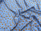 TISSU 100% VISCOSE IMPRIMÉ MINI FLEURS FOND BLEU CIEL - My Little Coupon