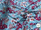 TISSU 100% VISCOSE IMPRIMÉ MOTIFS FLOREAUX FOND TURQUOISE - My Little Coupon