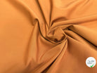 TISSU COTON POLYAMIDE ULTRA STRETCH ASPECT PEACHSKIN CARAMEL 61% COTON - My Little Coupon