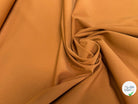 TISSU COTON POLYAMIDE ULTRA STRETCH ASPECT PEACHSKIN CARAMEL 61% COTON - My Little Coupon