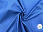 TISSU COUPE VENT REVERSIBLE NOIR ET BLEU ROYAL - My Little Coupon - tissu - coudre