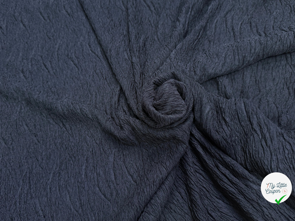 Tissu fluide cloqué stretch noir