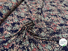 TISSU FLUIDE IMPRIMÉ FLORAL PRINTEMPS SUR FOND BLEU - My Little Coupon