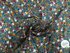 TISSU FLUIDE MOTIF LIBERTY SUR FOND BLEU CIEL - My Little Coupon