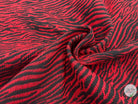TISSU JACQUARD MOTIF ZÈBRE ROUGE ET NOIR - My Little Coupon - tissu - coudre