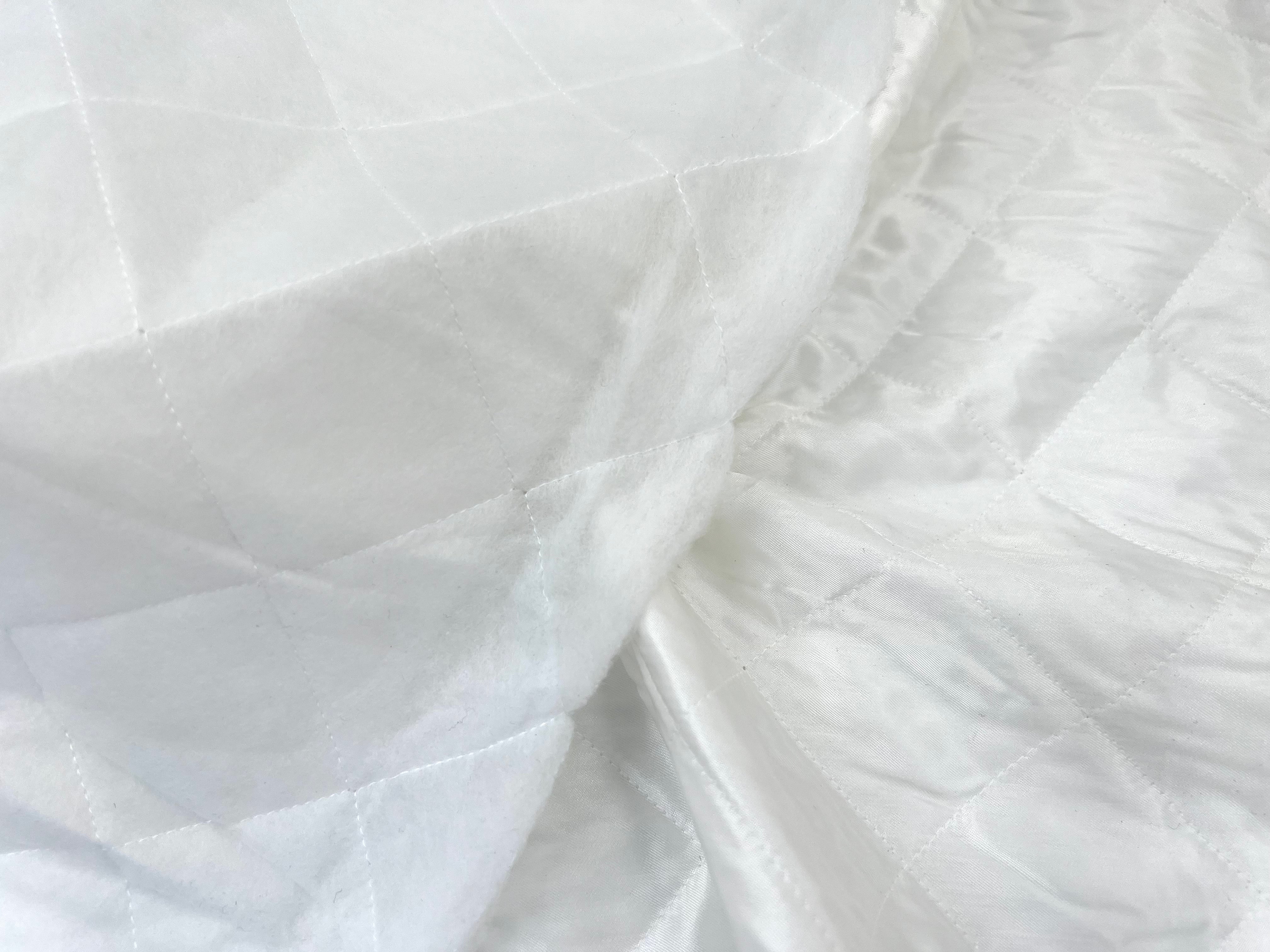 TISSU MATELASSÉ BLANC CASSÉ GROS LOSANGES MLC INTERN