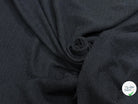 Tissu tweed de coton mi-saison noir - texture en gros plan
