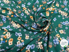 VISCOSE À FLEURS JAPONAISES BLEUES ET BEIGES SUR FOND VERT - My Little Coupon