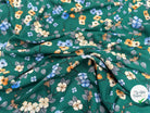 VISCOSE À FLEURS JAPONAISES BLEUES ET BEIGES SUR FOND VERT - My Little Coupon