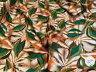 VISCOSE FLUIDE FOND BEIGE MOTIFS FEUILLAGES VERT ORANGE - My Little Coupon
