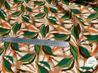 VISCOSE FLUIDE FOND BEIGE MOTIFS FEUILLAGES VERT ORANGE - My Little Coupon