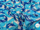 VISCOSE FLUIDE FOND BLANC IMPRIMÉE TOURBILLON ROI TURQUOISE - My Little Coupon
