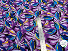 VISCOSE FLUIDE FOND VIOLET MOTIFS FEUILLAGES BLEU NOIR - My Little Coupon