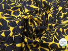 VISCOSE IMPRIMÉE FLEURS NOIRES FOND OCRE MSO