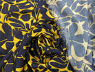 VISCOSE IMPRIMÉE FLEURS NOIRES FOND OCRE MSO