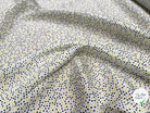 VISCOSE LEGREMENT SATINÉE FOND BLANC CERLES NOIR ET JAUNE QUALITÉ COMO - My Little Coupon