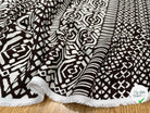 VISCOSE PEAU DE PÊCHE FOND MARRON MOTIFS BLANC - My Little Coupon