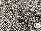 VISCOSE PEAU DE PÊCHE FOND MARRON MOTIFS BLANC - My Little Coupon