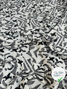 VISCOSE SATIN TISSU IMPRIMÉ TACHES NOIR - My Little Coupon