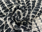 LAINAGE MANTEAU BOUCLETTE RECTANGLE BLANC CASSÉ SUR FOND NOIR - My Little Coupon - tissu - coudre